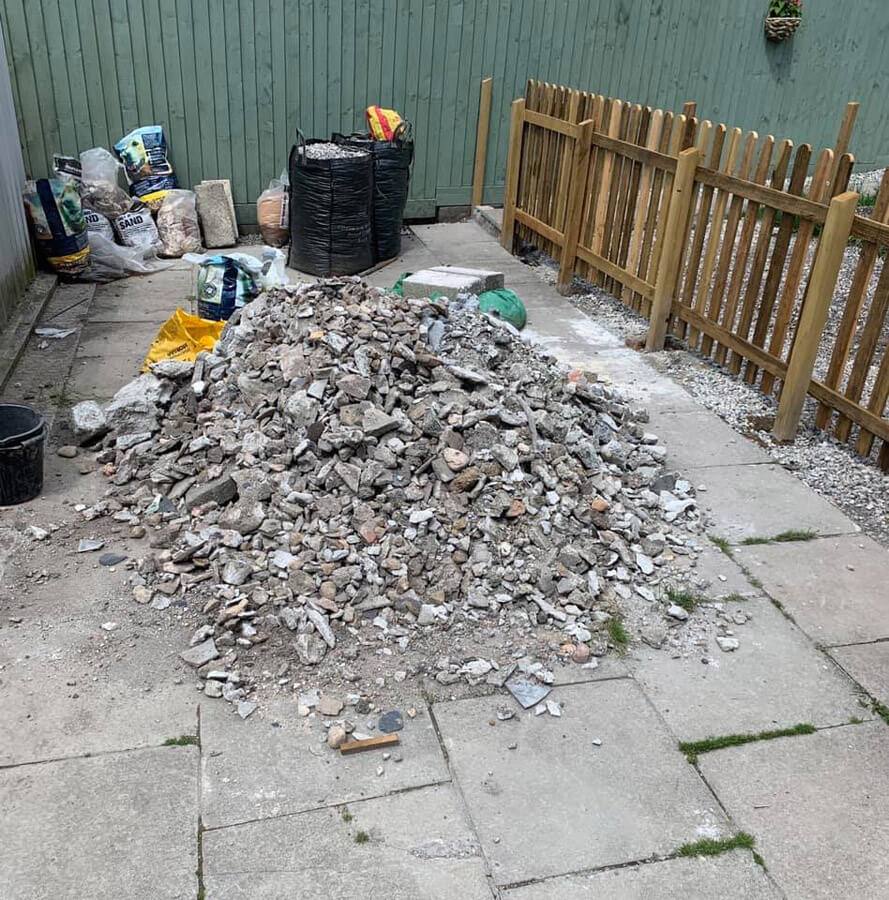 waste piled up in garden