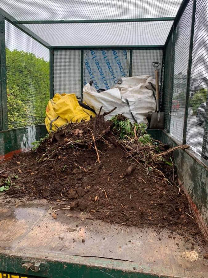 soil being taken away in a van