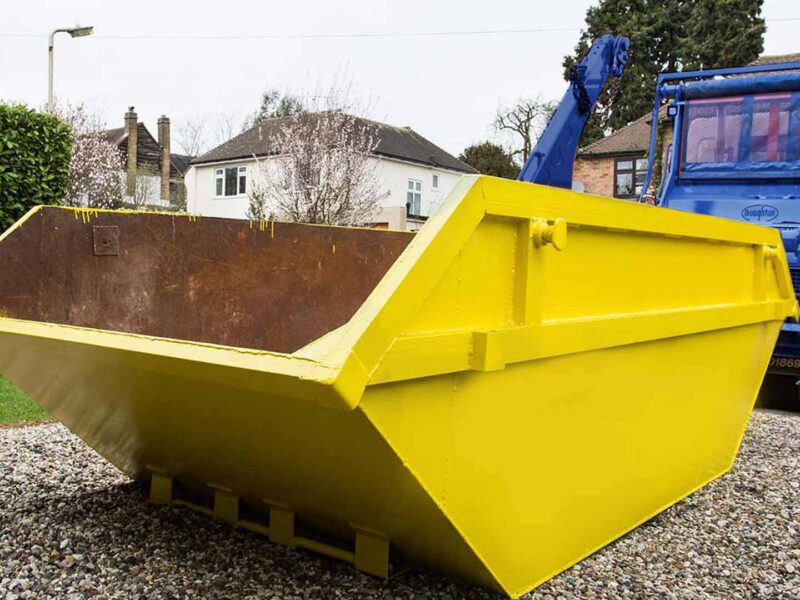 image of a private skip for hire being delivered by a skip hire company
