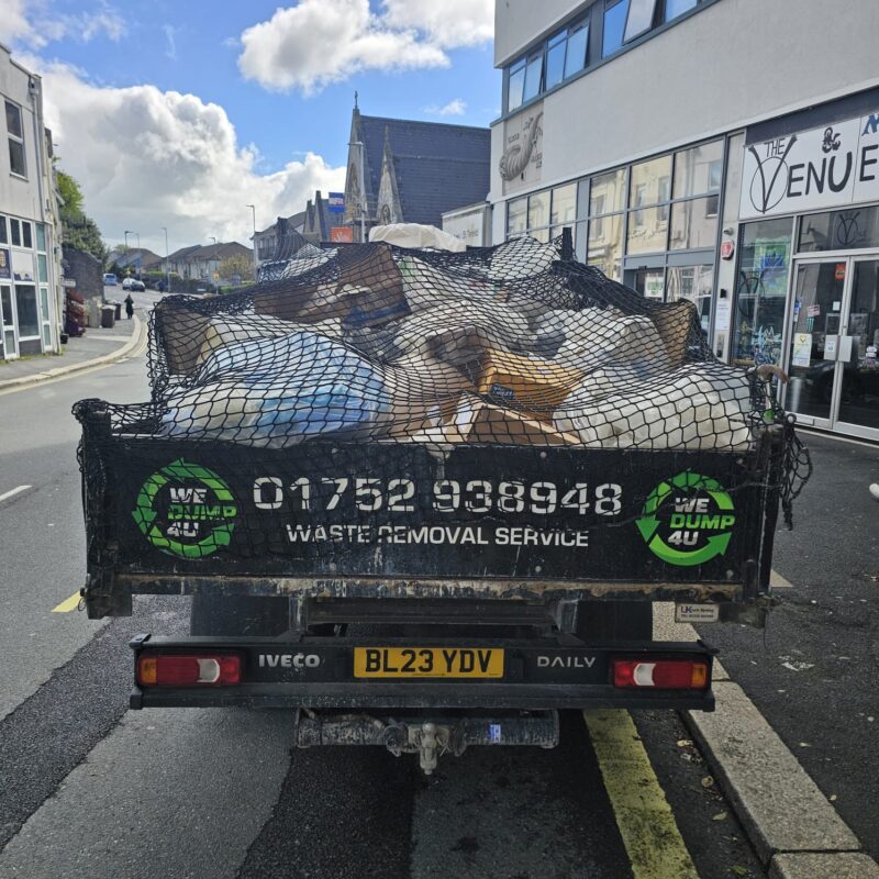 Back of a full Wedump4u van