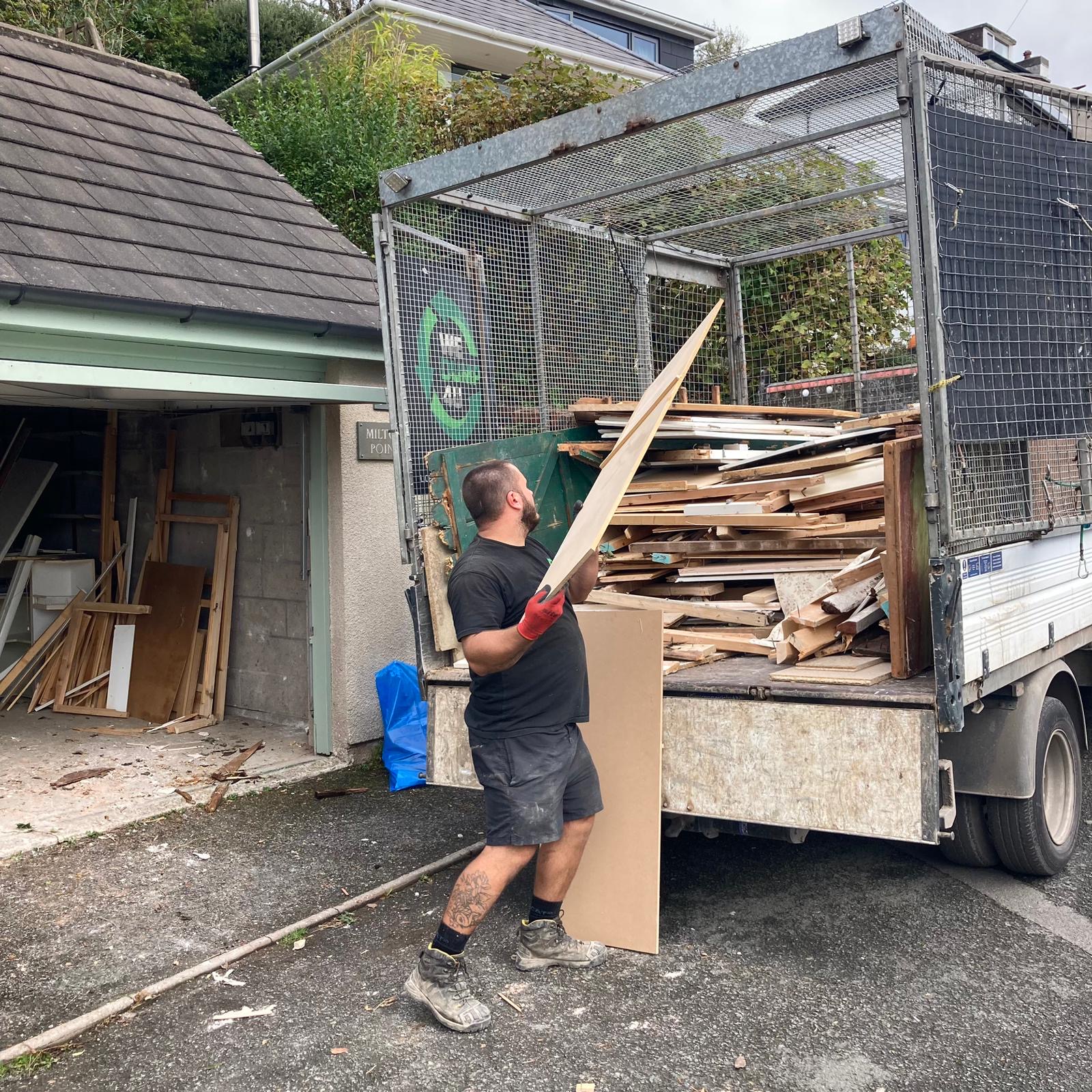 We dump for you employee loading van